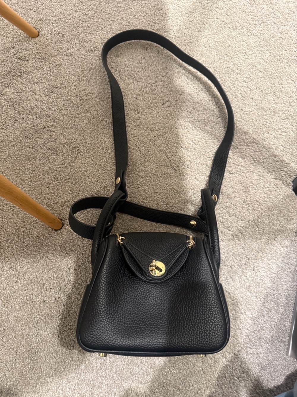 Black Pebbled Leather Crossbody Bag with Gold Accent